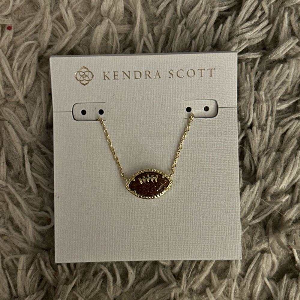 Kendra Scott gold football necklace